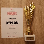 Turniej karate w Płocku - dyplom i medal Wiktorii Koszałki.jpg